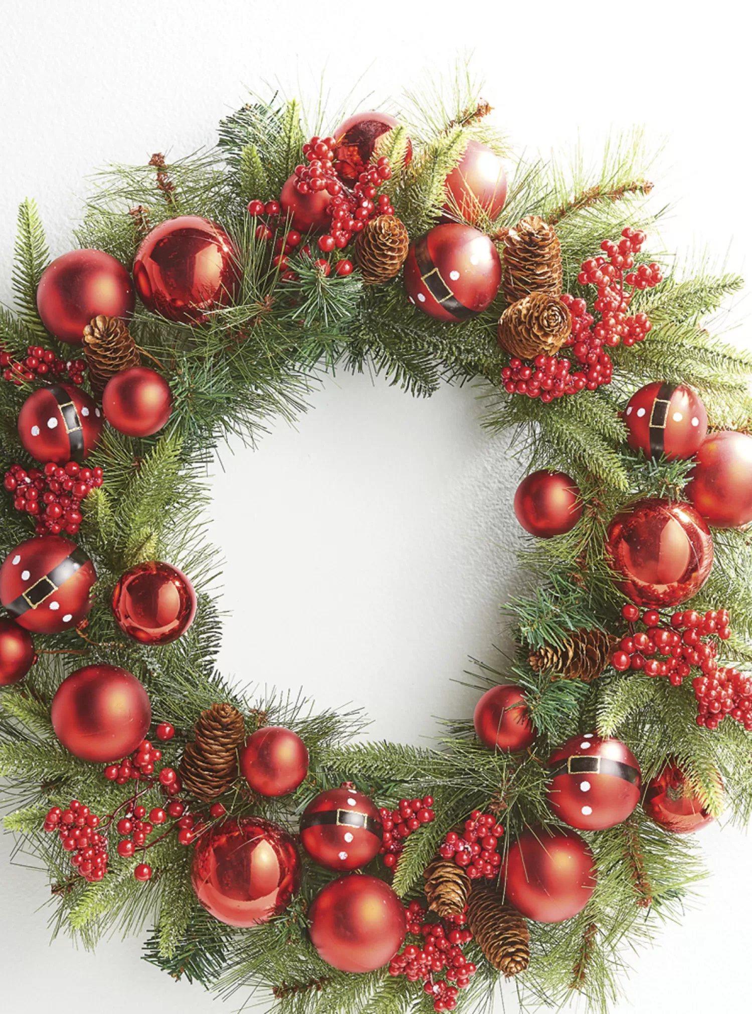 The Jolly Christmas Shop Sleigh Bells | Santa Christmas Decorations | Raz 26" Mixed Pine And Santa Belt Ball Christmas Wreath W4102346