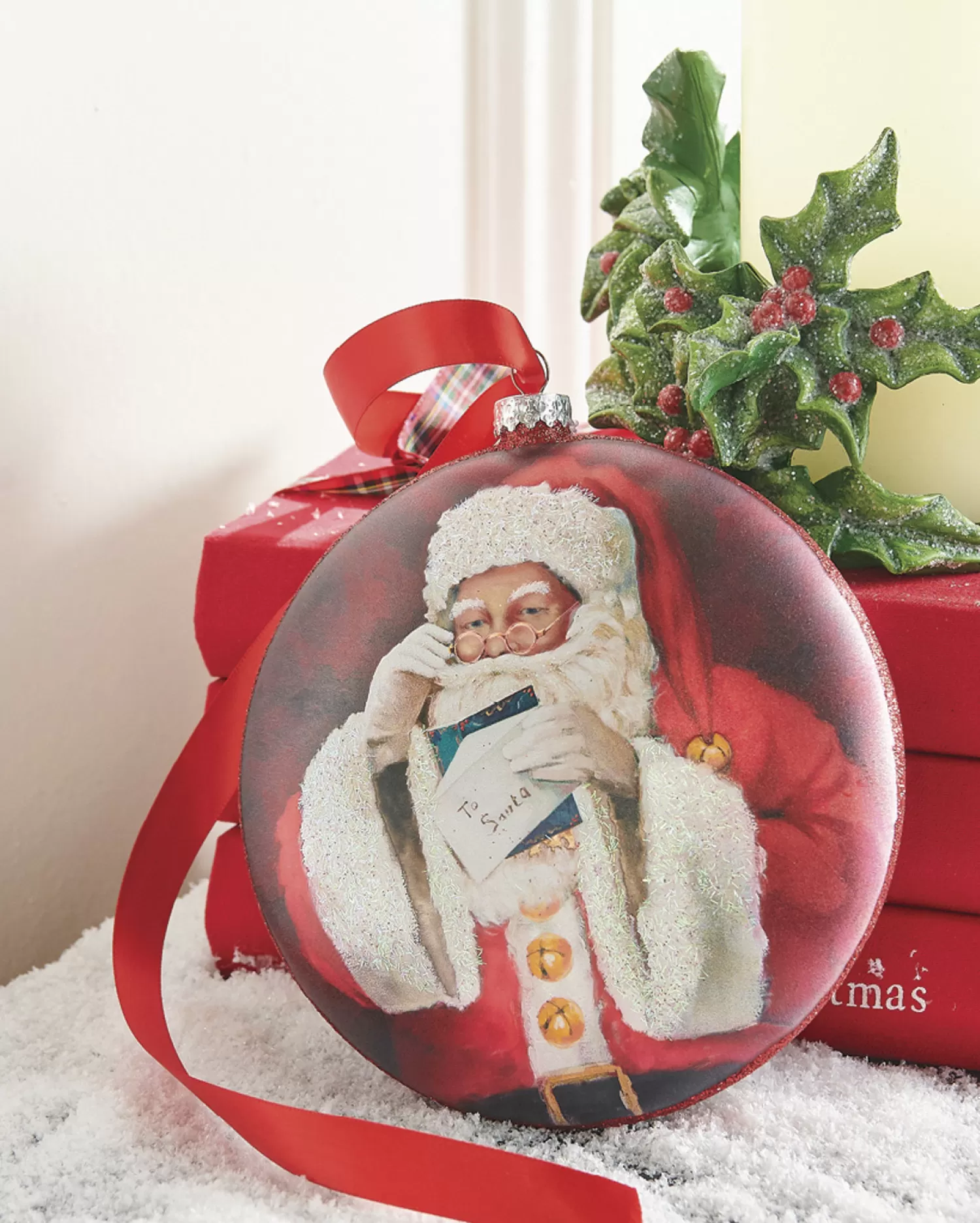 The Jolly Christmas Shop Sleigh Bells | Christmas Traditions | Raz 6" Santa Reading Letter Disc Glass Christmas Ornament 4252887