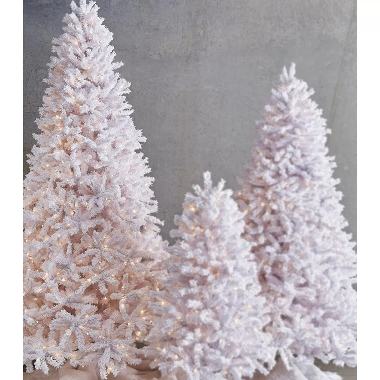 The Jolly Christmas Shop Trees, Wreaths & Garlands | Classic Carols | Raz 7.5' Snake Light Flocked White Tinsel Christmas Tree T4152011