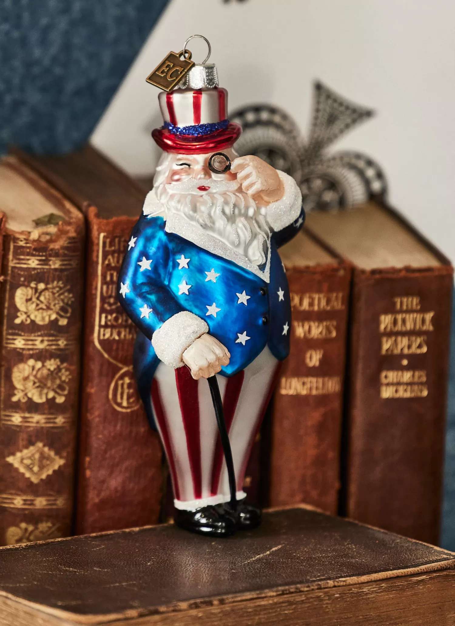 The Jolly Christmas Shop Santa Christmas Decorations | Beach Christmas Decorations | Raz Eric Cortina 5.5" Patriotic Santa Glass Christmas Ornament 4353129