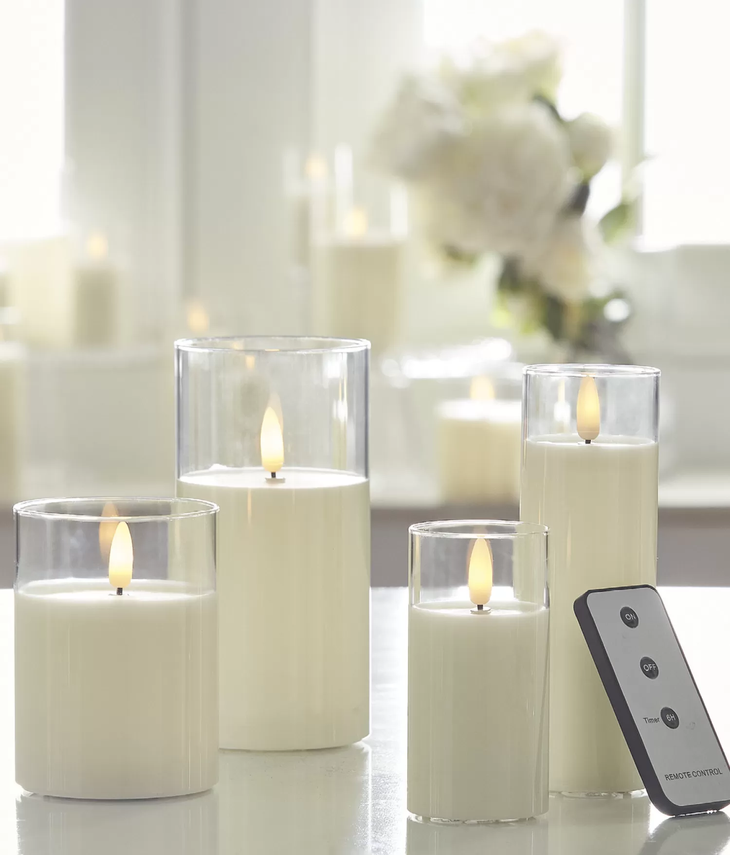 The Jolly Christmas Shop Figurines | Vintage Farm House | Uyuni Moving Flame Clear Glass Ivory Pillar Battery Candle